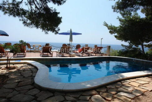 A house for sale on Hvar, Croatia, with a pool, un loungers