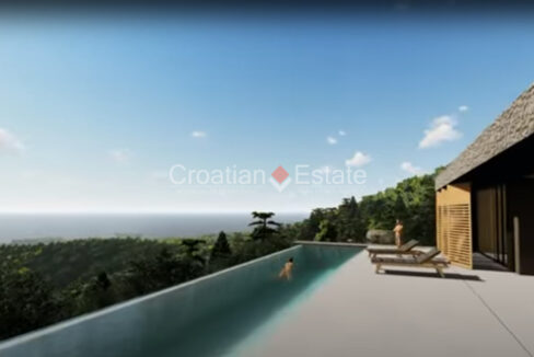 A land for sale on Korcula, Croatia, with a project for a villa with terrace with a pool and a sea view.