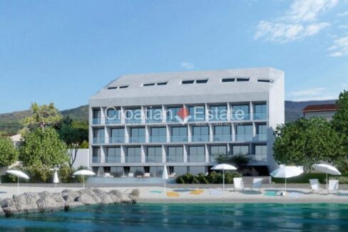 A seafront building plot for sale in Podstrana, Croatia, with a design project for a hotel.